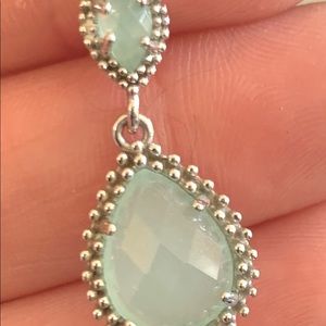 Kendra Scott earrings.